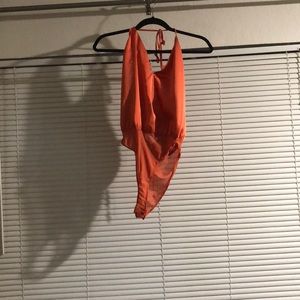 Orange halter bodysuit
